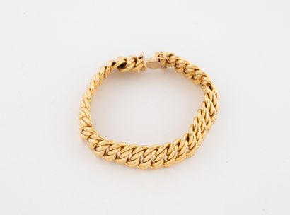 Bracelet gourmette en or (750) à maille américaine...
