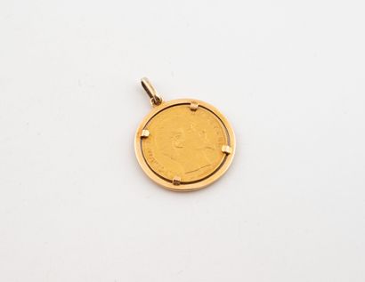 Yellow gold (750) pendant holding a 20-franc...