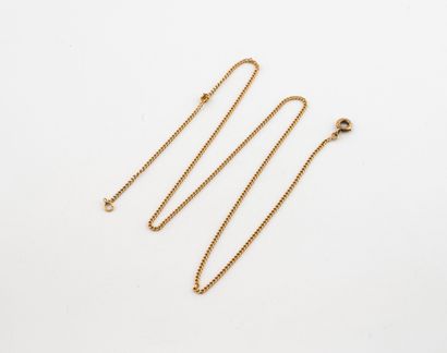 Yellow gold (750) curb chain.
Spring-ring...