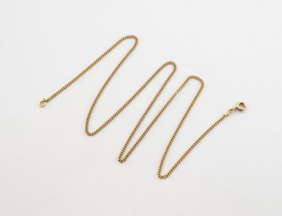 Yellow gold (750) curb chain.
Spring-ring...