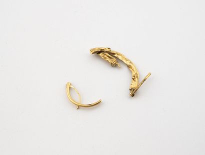 Débris d'or jaune (750).
Poids : 0.7 g.