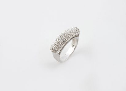 Ring in slightly domed white gold (750) centered...