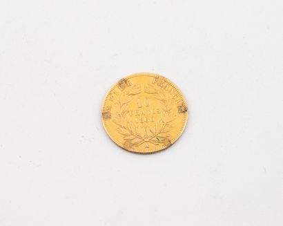 10 franc gold Napoleon III bareheaded coin.
1860.
Weight...