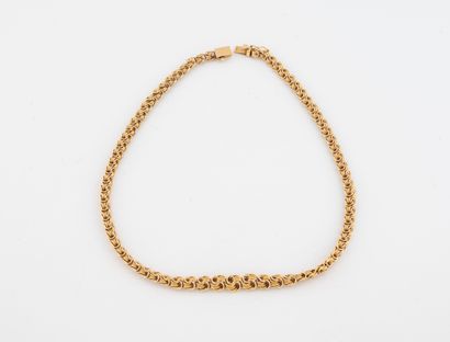 Fancy drop link necklace in yellow gold (750).
Ratchet...