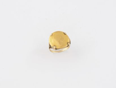 Yellow gold (750) ring centered with a 10-franc...