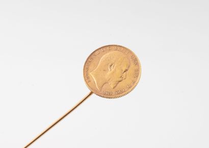 Tie pin in yellow gold (750) with a sovereign...