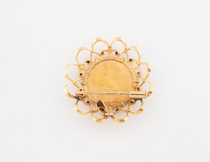Gold (750) pendant brooch with openwork scroll...