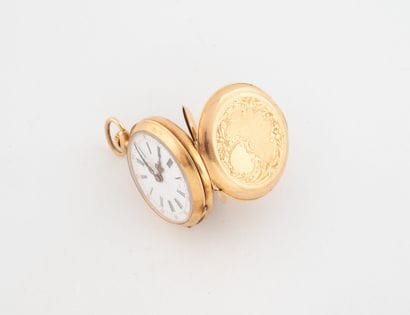 Yellow gold (750) collar watch. 
White enameled...