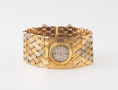 AXA
Montre bracelet de dame en or jaune (750).
Boîtier...