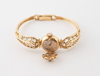 ERREL
Montre bracelet de dame en or jaune...