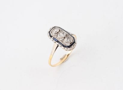 Petite bague en or jaune (750) et platine...
