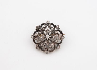 Broche pendentif en or jaune (750) et argent...