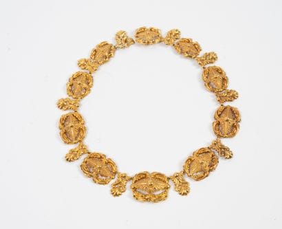 Collier articulé en tôle d'or (750) estampée...