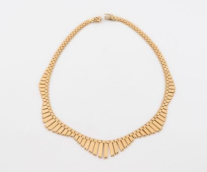 Collier draperie en or jaune (750) à maille...