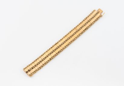 Bracelet ruban articulé en or jaune (750)...