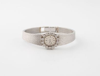 OMEGA
Montre bracelet de dame en or gris...