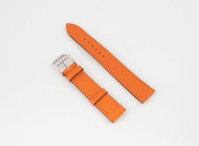 HERMES
Bracelet de montre en cuir orange,...