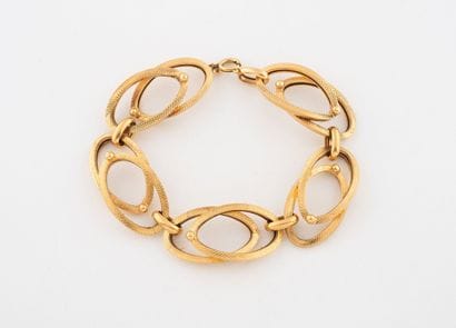 Bracelet en or jaune (750) à double maillons...