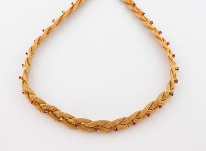 Collier en or jaune (750) composé d'une tresse...