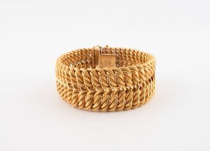 Large bracelet en or jaune (750) à maille...