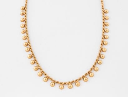 Collier en or jaune (750) à maille torsadée...
