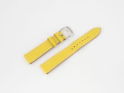 HERMES 
Bracelet de montre en cuir jaune,...
