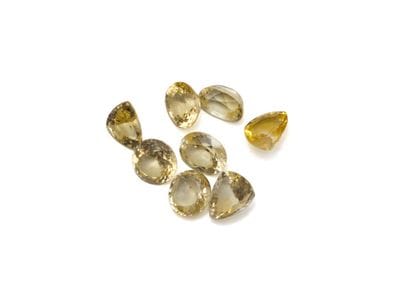 Lot de saphirs jaunes de taille variées sur...