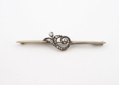 Broche barrette en or gris (750) et argent...