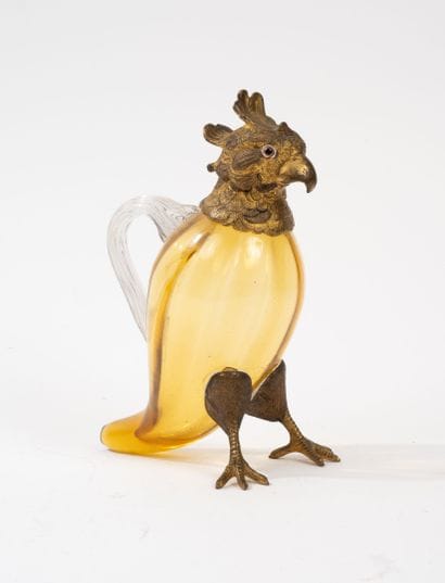 Flacon à parfum en forme de perroquet.
Le...