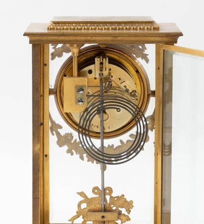 Pendule cage en laiton, ornementations de...