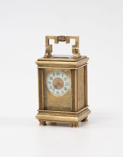 Petite pendulette de voyage.
En laiton et...