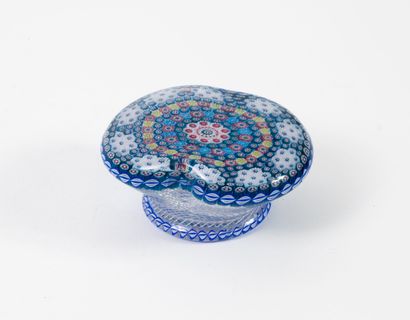 SAINT-LOUIS
A crystal paperweight in a constricted...