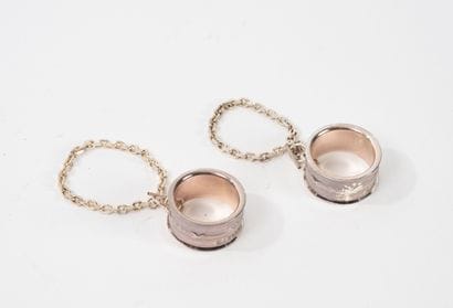 FOUQUET'S
Two key chains shaped like the...