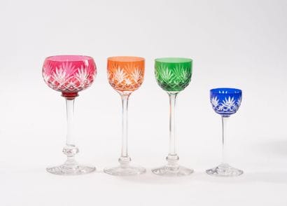 Set of colored crystal glasses with a geometric...