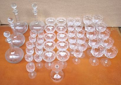 A set of crystal stemware engraved with garlands,...