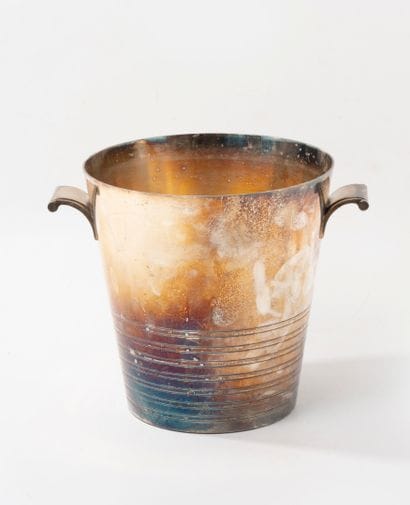 Frustoconical champagne bucket.
Made of silver...