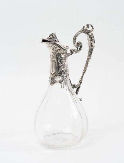Glass ewer with silver-plated metal frame...
