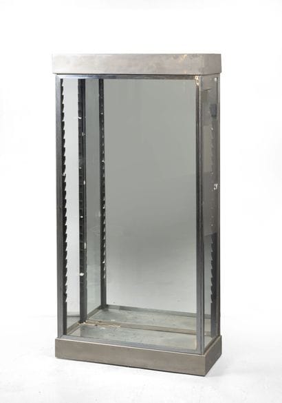 Display cabinet.
Made of metal, glass, and...