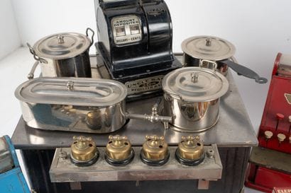 Set includes:
- A dollhouse stove or electric...