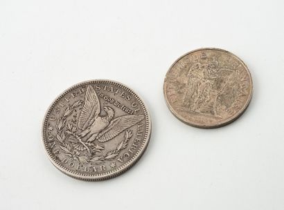 Silver set (900) consisting of:
- One 1-dollar...