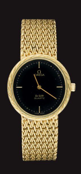 OMEGA
Montre bracelet d'homme en or jaune...