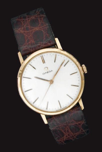 OMEGA
Montre bracelet d'homme en or jaune...