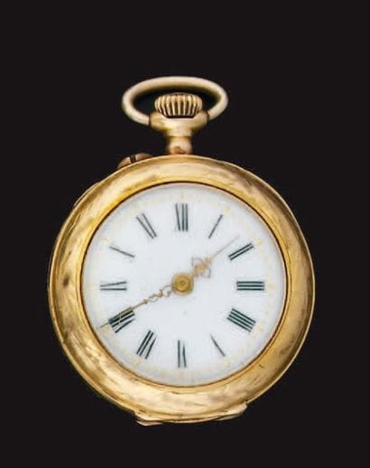 Montre de col en or jaune, le fond à décor...