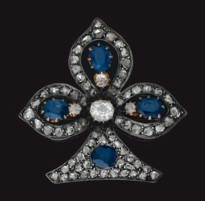 Broche en argent et or jaune en forme de...