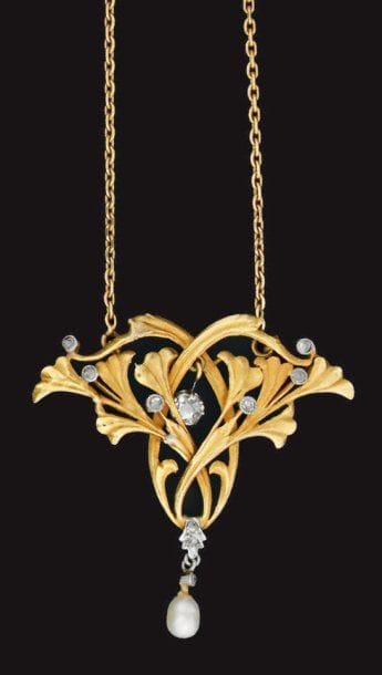 Collier en or jaune orné en pendentif d'un...