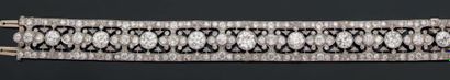 Bracelet articulé en platine ajouré pavé...