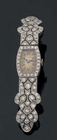 Montre-bracelet de dame à boîtier en tonneau...