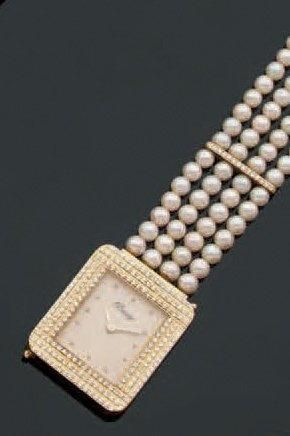 POIRAY
Montre-bracelet de dame en or jaune,...