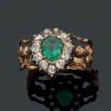Bague en or jaune et argent formée de deux...