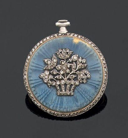 CARTIER
Montre de col en or gris et en or...
